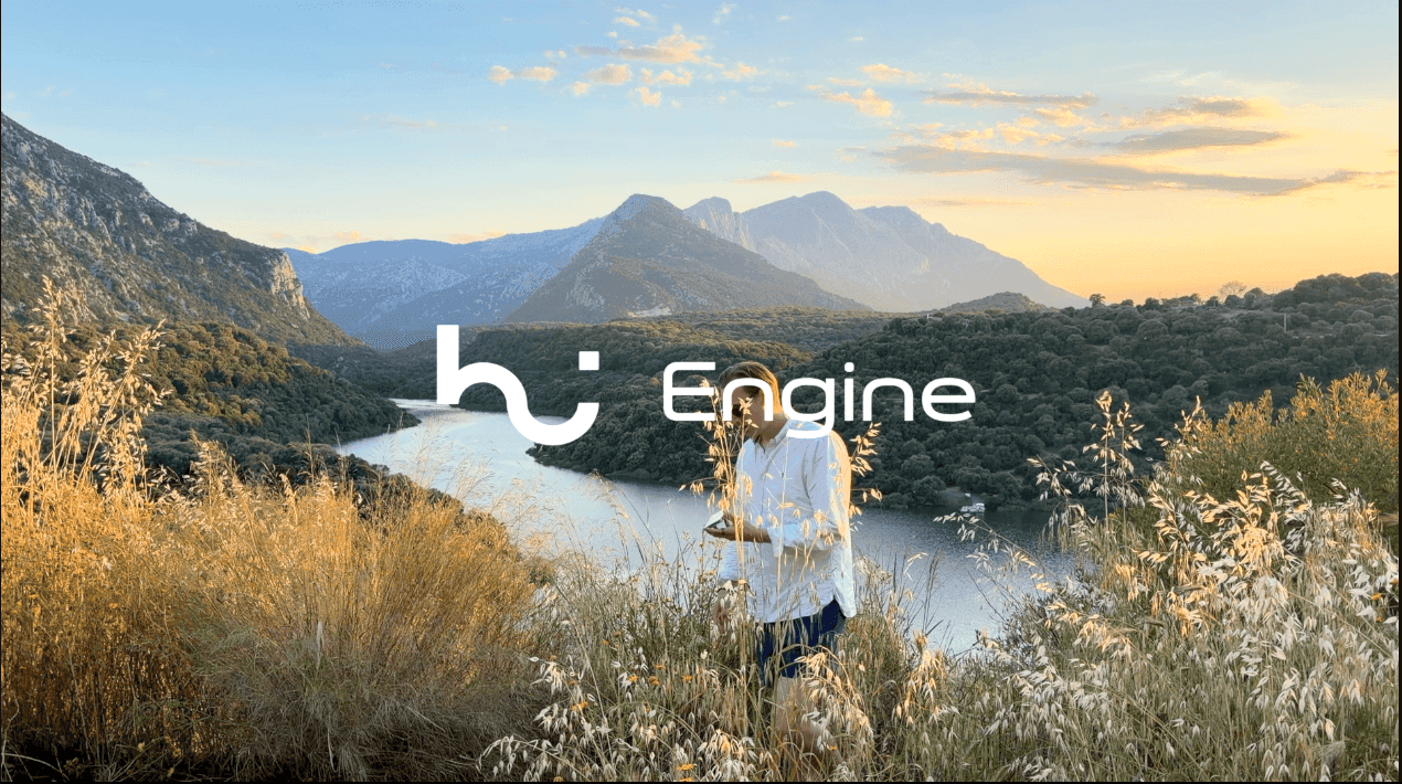 HI Engine wordmark over a mountain lake at golden hour